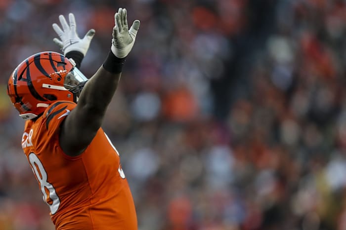 Dec 4, 2022; Cincinnati, Ohio, USA; Cincinnati Bengals defensive tackle DJ Reader (98) reacts after blocking a pass by Kansas City Chiefs quarterback Patrick Mahomes (not pictured) in the first half at Paycor Stadium. Mandatory Credit: Katie Stratman-USA TODAY Sports